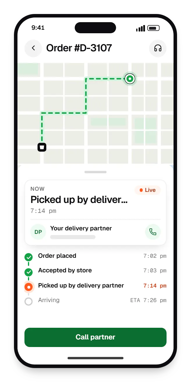 Delivery customer app order tracking on a phone, with live status steps