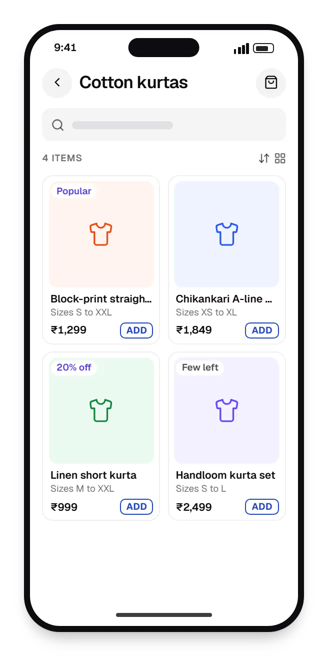 E-commerce shopping app catalogue on a phone, showing cotton kurtas with prices