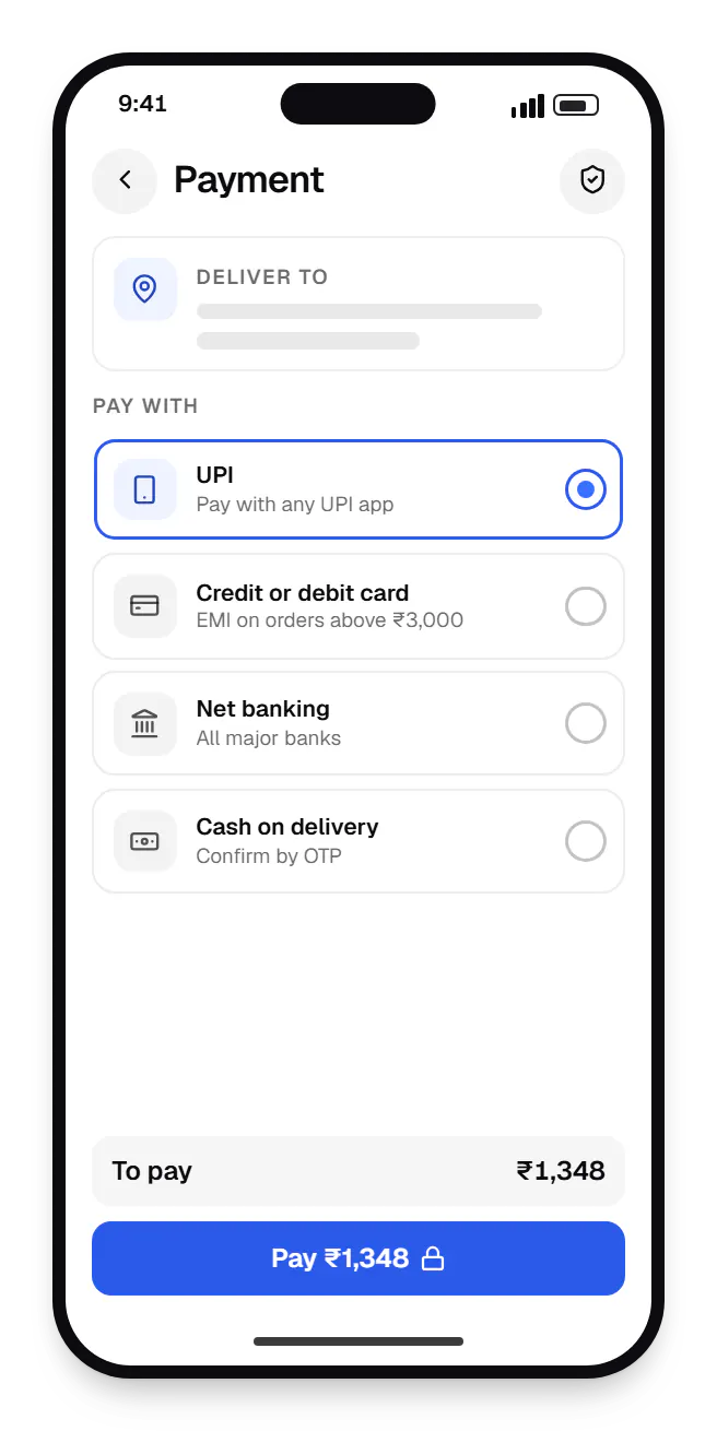 E-commerce software shopper app checkout on a phone, with UPI, credit or debit card and net banking options