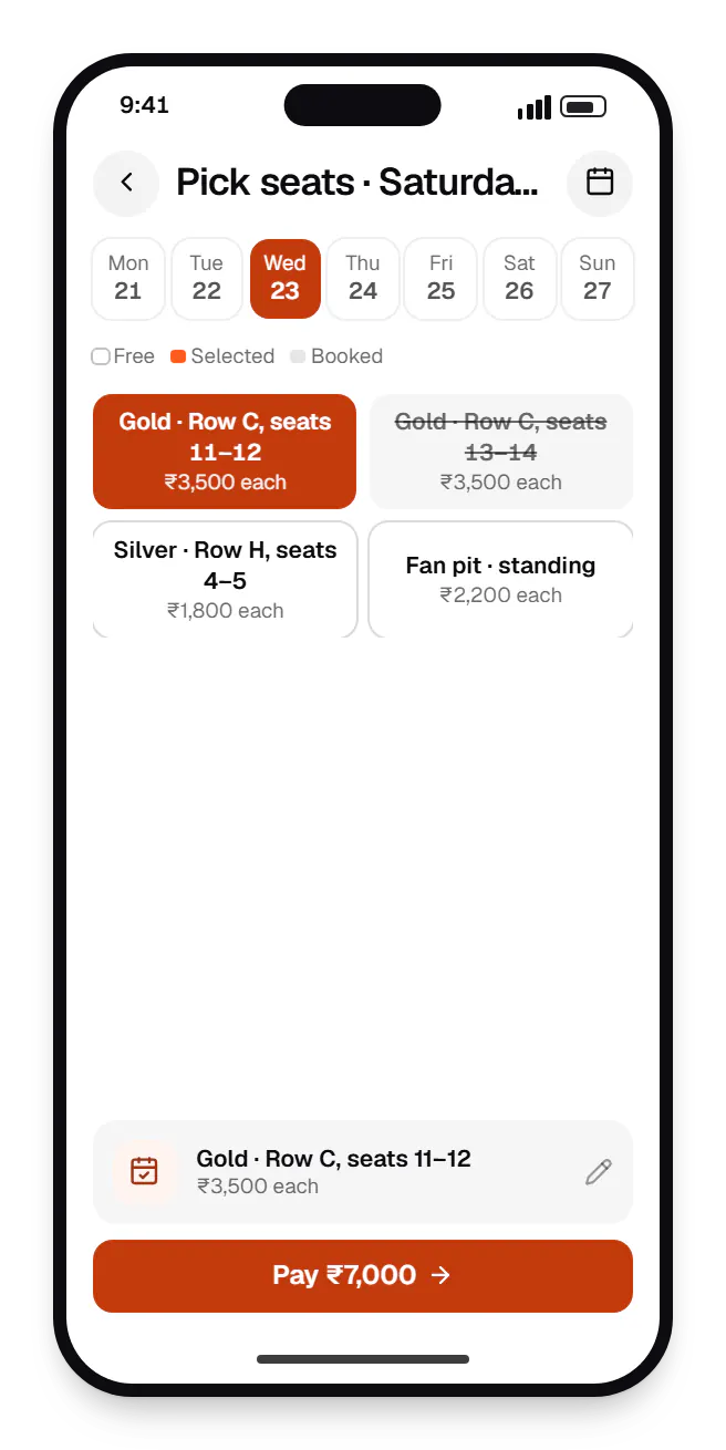 Entertainment software fan app booking slots on a phone, with open time slots