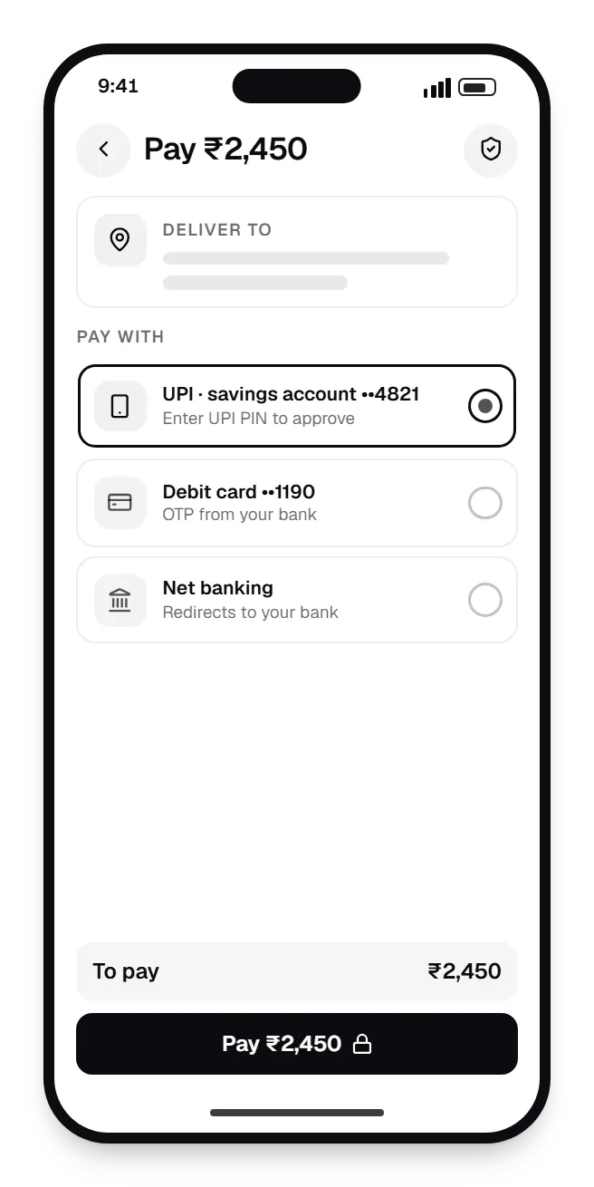 Fintech customer app checkout on a phone, with debit card ••1190 and net banking options
