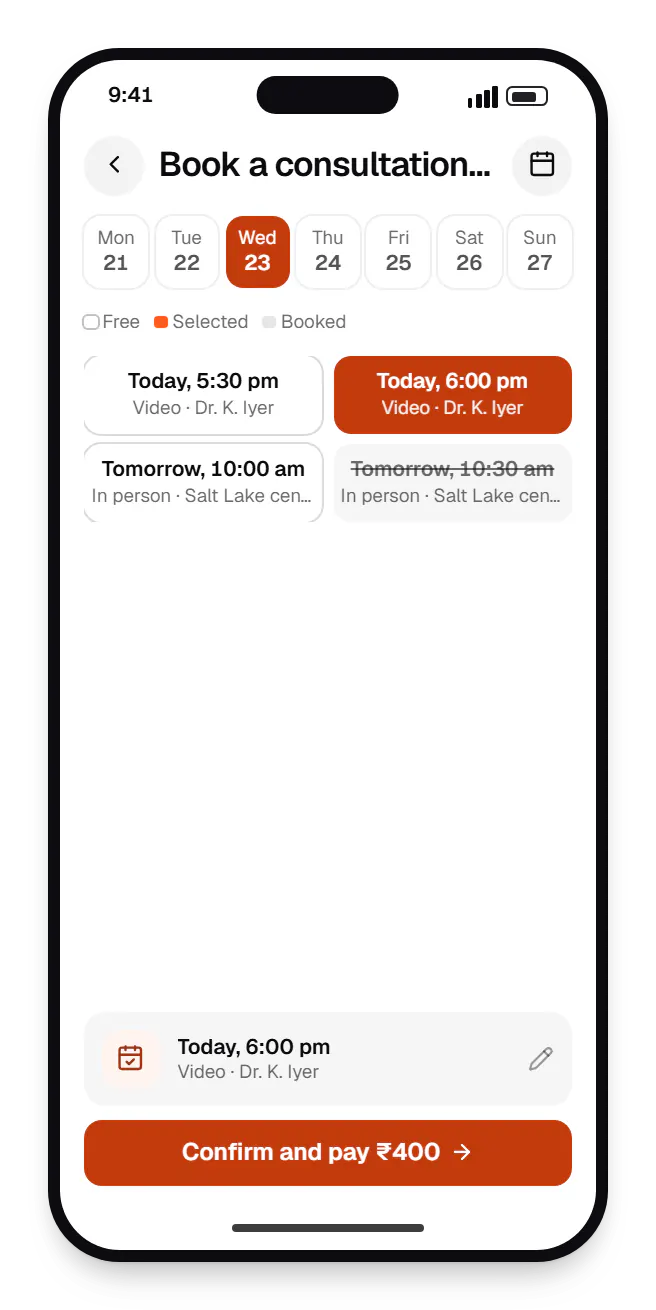 Healthcare software patient app booking slots on a phone