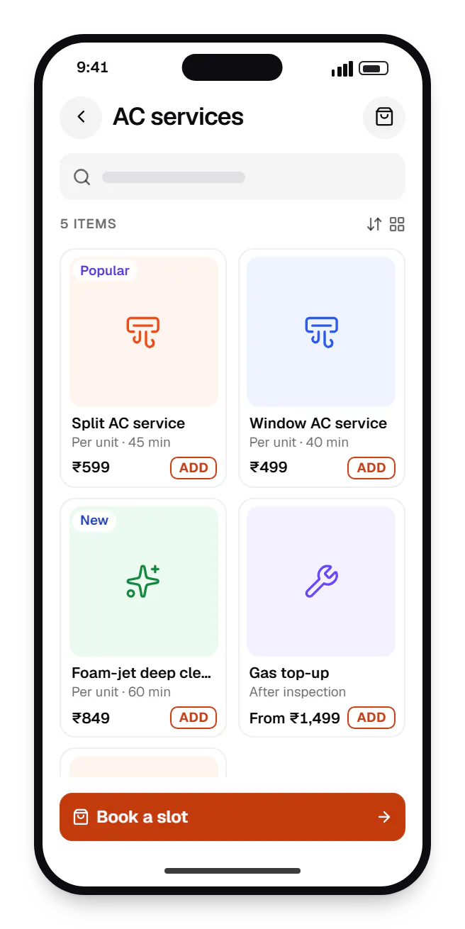Home services software customer app catalogue on a phone, showing AC services with prices