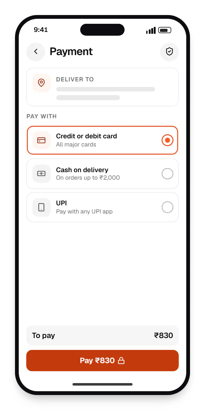 Mobile customer app checkout on a phone, with credit or debit card, cash on delivery and UPI options