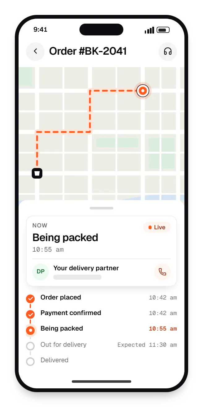 Mobile customer app order tracking on a phone, with live status steps